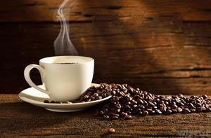 coffee cup and beans wood background